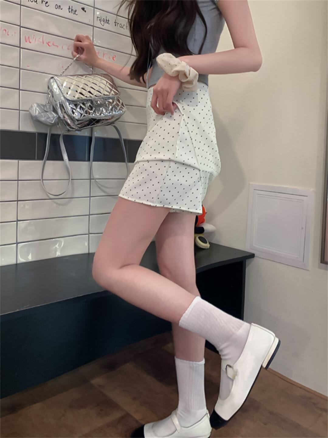 Actual shot of a French high-waist slimming polka-dot anti-exposure skirt that actually covers the hips and is an A-line skirt
