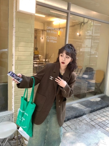 Designer denim skirt with large-sized frayed pockets, vintage water-washed blue high-waisted A-line maxi skirt for plus-size women