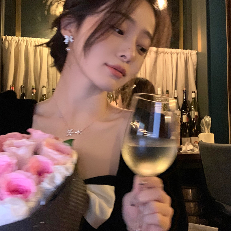 S925銀針輕奢小眾超閃滿鑽蝴蝶結耳環女百搭氣質長款流蘇珍珠耳釘