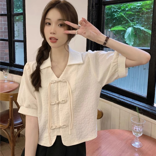 Retro buckle shirt women's puff sleeve top design niche summer new white French short-sleeved shirt