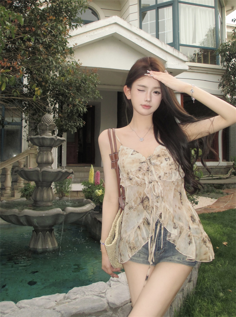 Actual shot of floral camisole top with niche ruffled sexy pure lust short vest