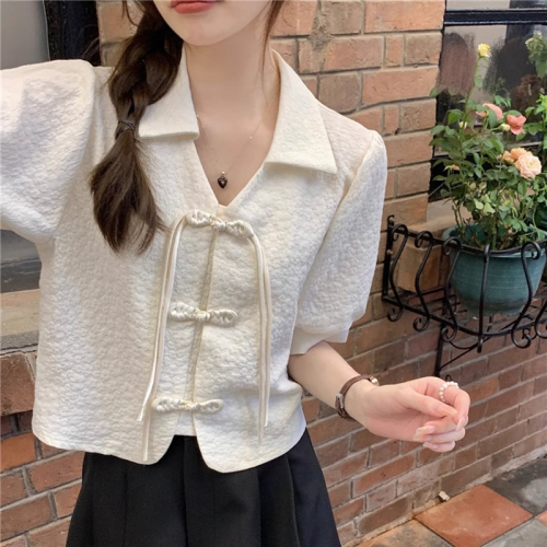 Retro buckle shirt women's puff sleeve top design niche summer new white French short-sleeved shirt