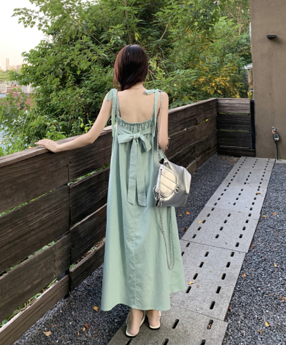Actual shot of Summer Dopamine’s unique and super pretty draped suspender dress for seaside vacation