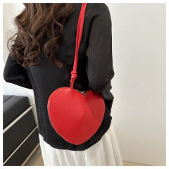 Heart-shaped trendy and stylish solid color single-shoulder crossbody bag for women, 2024 spring new versatile Instagram casual women's bag