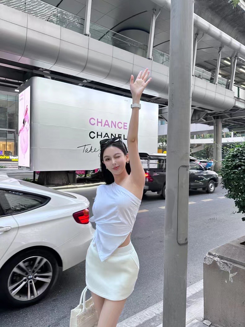 woppei 氣質性感不規則斜領露肩背心百搭a字短款半裙三色套裝女