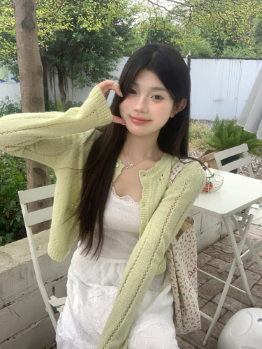 Actual shot ~ Early spring new Korean style wear hollow short knitted cardigan + elastic waist skirt two-piece set