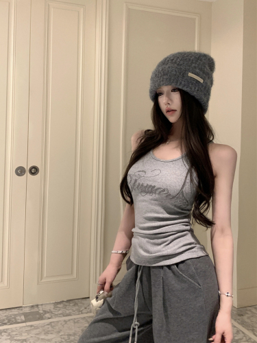 Real shot of retro sexy hottie with sparkling diamonds, tight-fitting, slim, versatile casual outerwear vest top for women