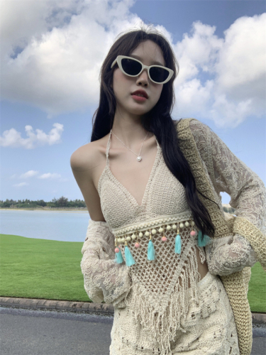 Real shot of lace crocheted long-sleeved cardigan + hollow ethnic style tassel suspender + crocheted high-waisted shorts three-piece set