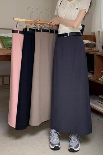 Actual shot of suit skirt for women with high waist, slimming and drapey straight A-line slit mid-length skirt with free belt