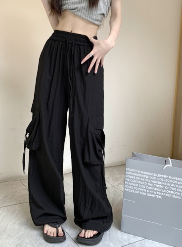Actual shot of American sweetheart loose straight mid-waist casual overalls for women with large pockets and lace-up trousers