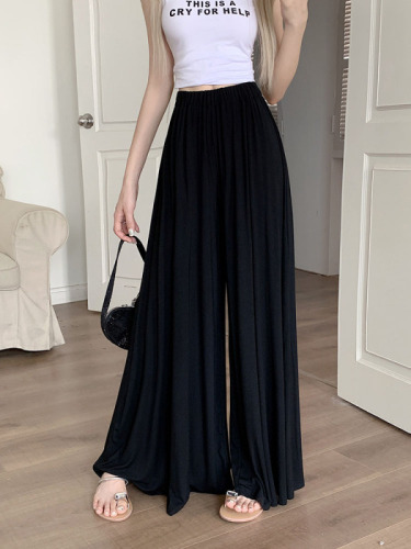 Real shot of thin knitted wide-leg pants for women, summer high-waisted, loose, slimming and drapey trousers