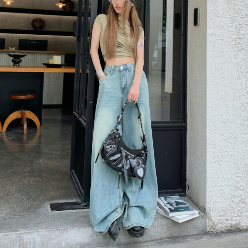 Real shot of washed vintage Dian blue summer style subculture wide-leg denim floor-sweeping trousers with elephant legs and large trousers