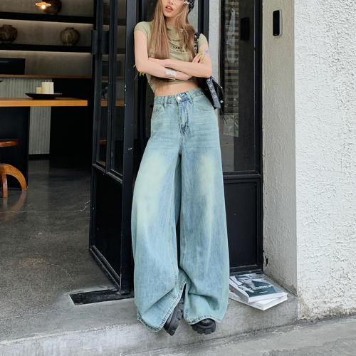 Real shot of washed vintage Dian blue summer style subculture wide-leg denim floor-sweeping trousers with elephant legs and large trousers