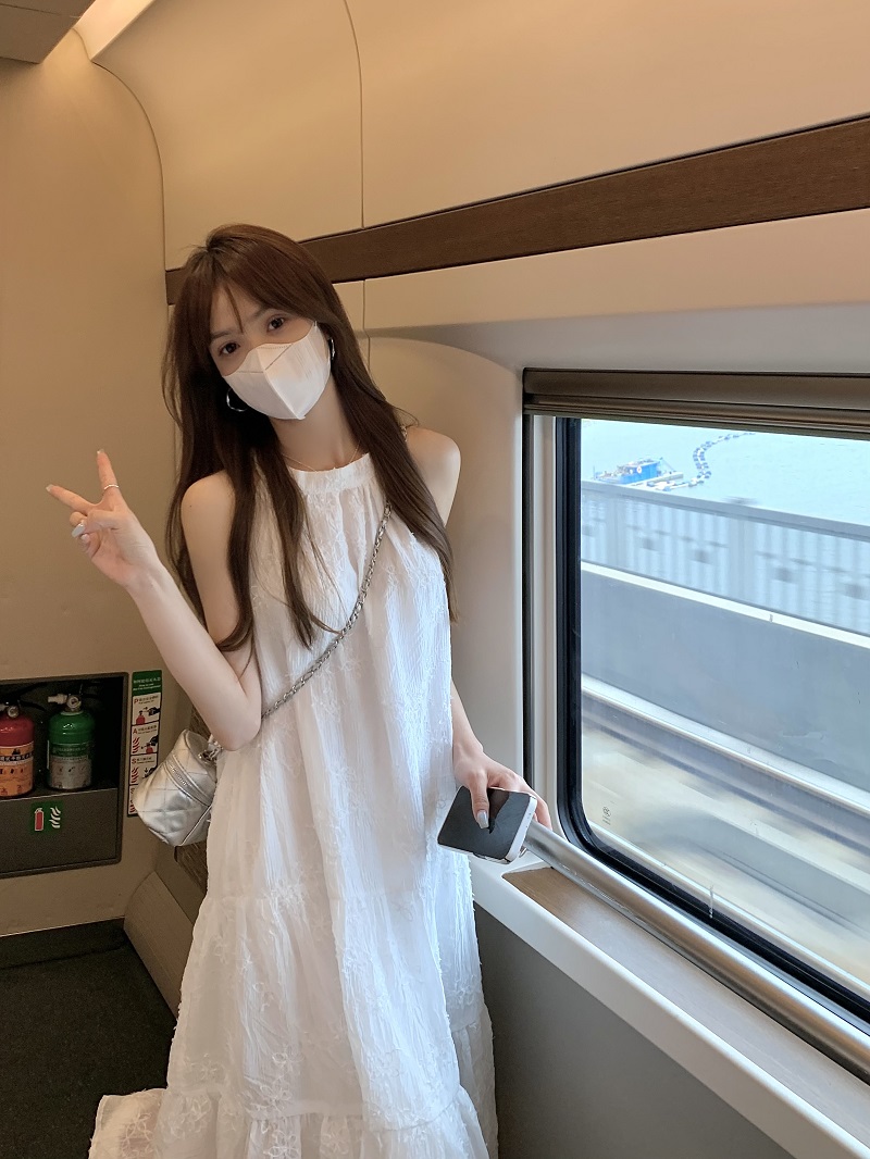 Real shot of French high-end halterneck white dress