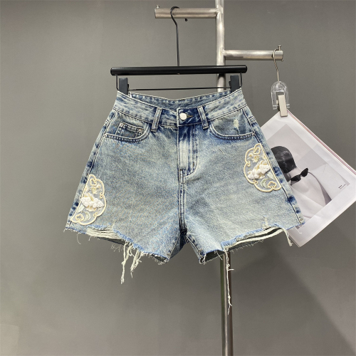 Niche design Chinese style embroidered disc buckle ripped raw edge denim shorts for women spring and summer wide leg A-line hot pants trendy