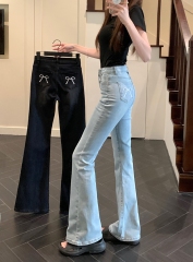 Actual shot#High-waisted micro-flared denim trousers for women with design back pocket bow embroidered floor mopping trousers