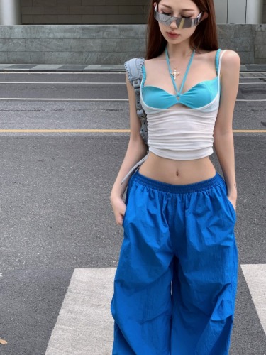 Real shot of slim-fitting camisole, two-piece top, loose wide-leg trousers, fashionable hot girl three-piece suit