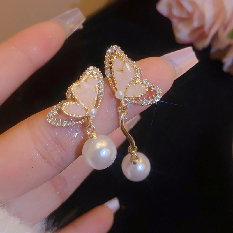 S925 silver needle high-end asymmetric butterfly earrings for women ins fashion light luxury niche pearl earrings earrings