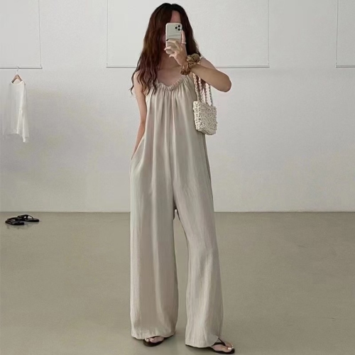 Korean chic simple lazy style V-neck exposed collarbone splicing ear-hem loose casual suspender jumpsuit
