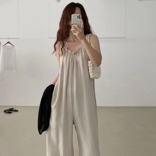 Korean chic simple lazy style V-neck exposed collarbone splicing ear-hem loose casual suspender jumpsuit