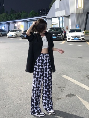 Actual shot of high-waist casual pants, loose printed drapey straight wide-leg pants