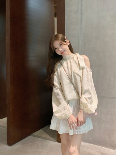 Real shot of Korean chic Xia wearing an off-shoulder polka-dot halterneck chiffon top