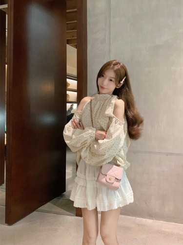 Real shot of Korean chic Xia wearing an off-shoulder polka-dot halterneck chiffon top