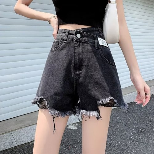 Actual shot of 2024 ripped denim shorts for women in summer, high-waisted, loose, slim, irregular, large size, A-line hot pants