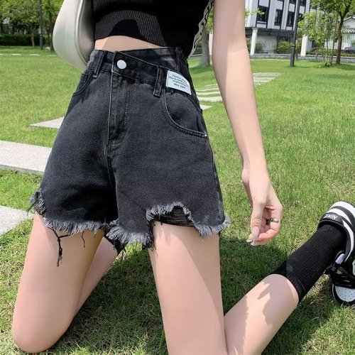 Actual shot of 2024 ripped denim shorts for women in summer, high-waisted, loose, slim, irregular, large size, A-line hot pants