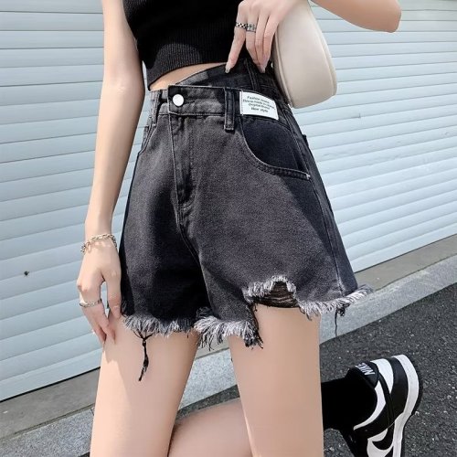 Actual shot of 2024 ripped denim shorts for women in summer, high-waisted, loose, slim, irregular, large size, A-line hot pants