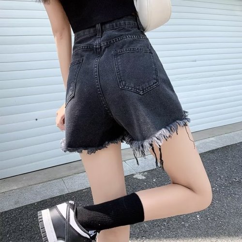 Actual shot of 2024 ripped denim shorts for women in summer, high-waisted, loose, slim, irregular, large size, A-line hot pants