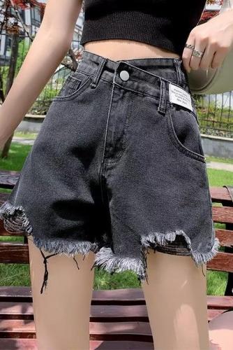 Actual shot of 2024 ripped denim shorts for women in summer, high-waisted, loose, slim, irregular, large size, A-line hot pants