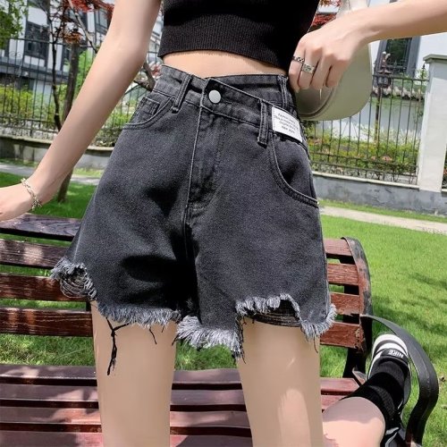 Actual shot of 2024 ripped denim shorts for women in summer, high-waisted, loose, slim, irregular, large size, A-line hot pants