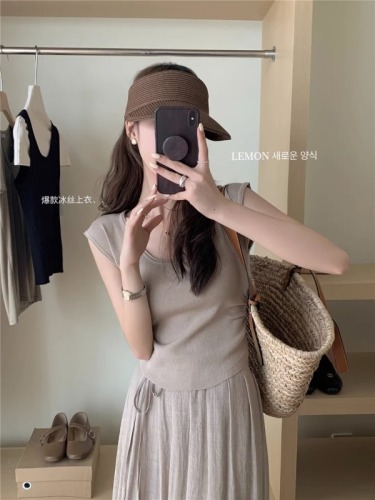 Korean niche flying sleeve knitted sweater + gentle and simple strapped cotton and linen skirt with waist rope