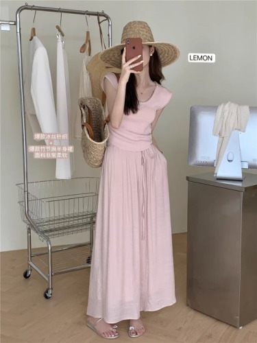 Korean niche flying sleeve knitted sweater + gentle and simple strapped cotton and linen skirt with waist rope