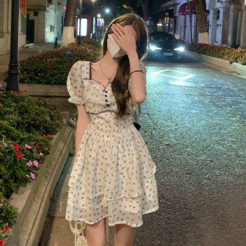 Leaky back bow dress for women in summer for petite French sweet and spicy style waist-revealing floral skirt with niche design