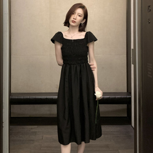 Seaside resort style black dress 2024 new French waist mid-length flying sleeve summer women's skirt