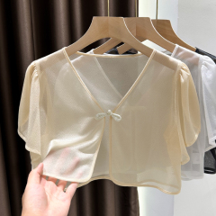 Soft spaghetti strap dress with a matching shawl—elegant summer design featuring delicate flutter sleeves, a cropped silhouette, lightweight sun-protection qualities, and a breathable mesh cardigan top.