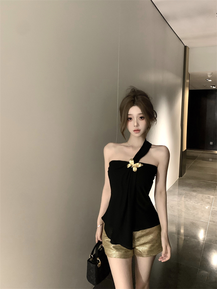 Custom-made golden butterfly brooch top with one-shoulder strap and gold shorts