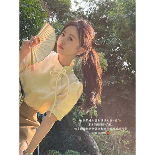 A modern Chinese style national costume top with a unique design, targeted at a niche market, featuring a high-end, French retro short-sleeve blouse for summer.