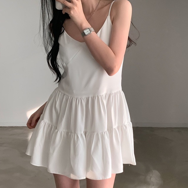 Korean chic new style French simple V-neck suspender skirt, feminine and age-reducing versatile baby doll skirt