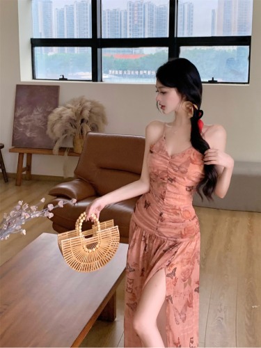 Real shot of sunset over the Nile River, French-style high-end pleated slim-fitting floral dress for women