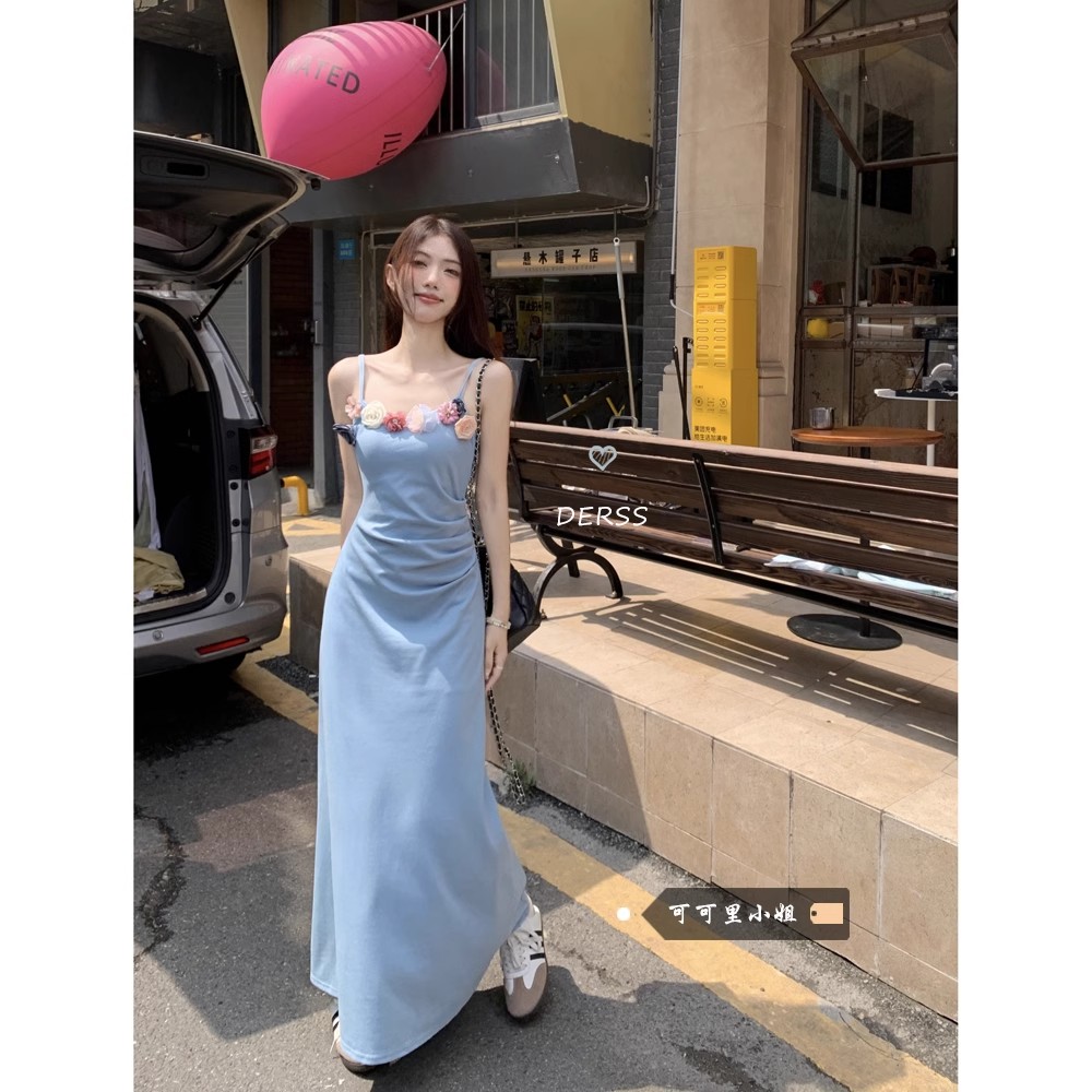 Beautiful flower suspender dress for women on seaside vacation, slim waist and French style long skirt