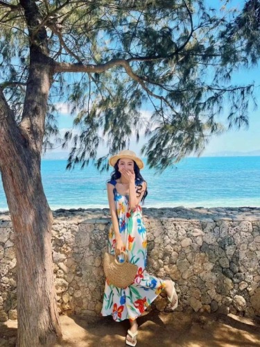 Sanya seaside resort beach dress Xishuangbanna travel long dress Yunnan Dali loose printed suspender dress