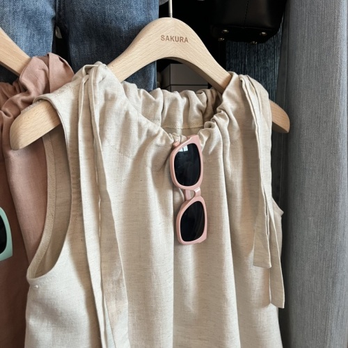 Korean style loose and versatile solid color drawstring sleeveless vest for women in summer, thin style, slim and chic, trendy tops