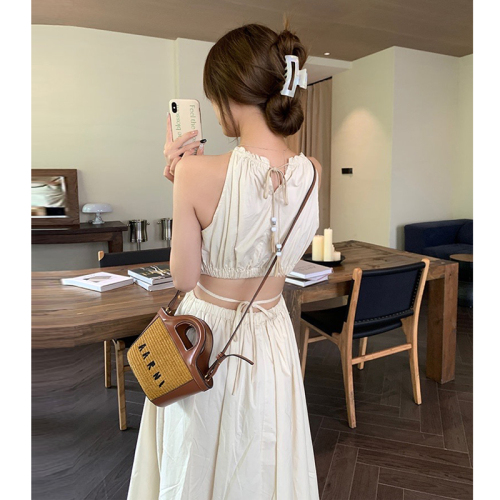 Halter neck suspender dress for women, summer design, hollow waist, slimming temperament, seaside beach vacation long dress