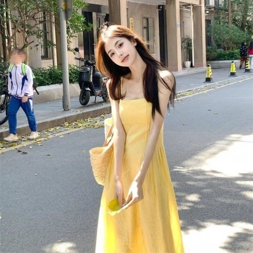 French 2024 summer new style halterneck suspender yellow dress gentle vacation high-end loose slimming long skirt