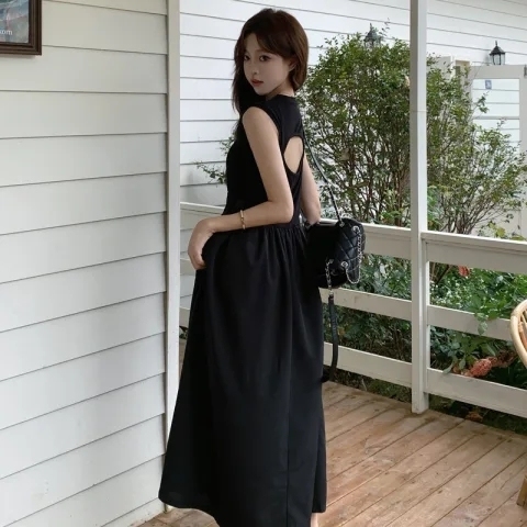赫本风茶歇法式黑色吊带背心连衣裙女2024新款夏季气质长裙