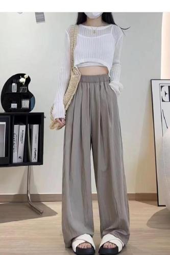 Not a real shot. Ice silk Yamamoto pants for women in summer. High-waisted and drapey for small people. Japanese style lazy apricot wide-leg pants.