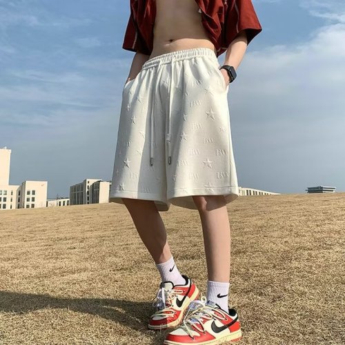 Shorts for men and women, summer trendy brand concave and convex printed five-point pants for women, trendy sports, boys' loose casual pants